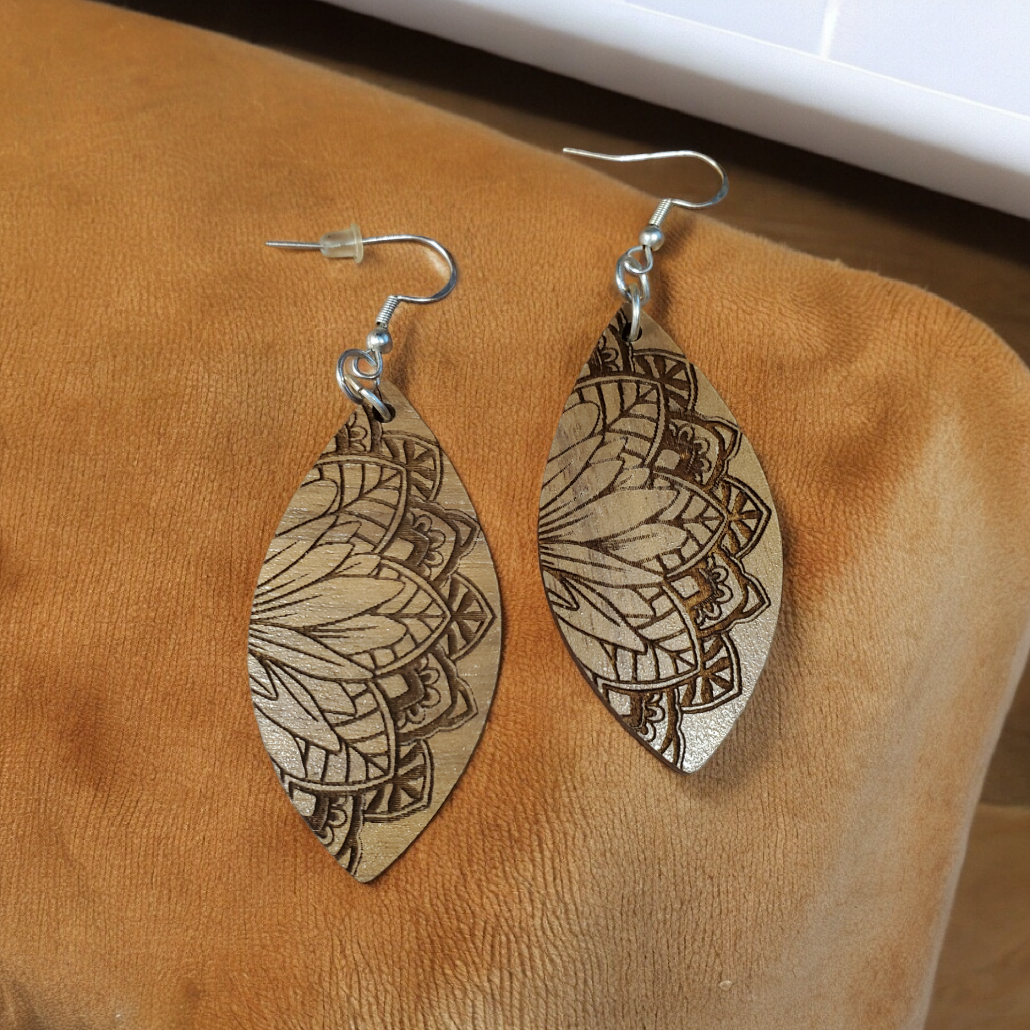 Laser Engraved Floral Cat Eye Shaped Wooden Earrings